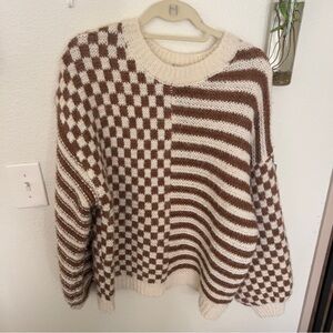 Brown and white checkered sweater